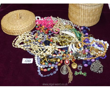 A basket of miscellaneous costume jewellery, necklaces, beads etc.