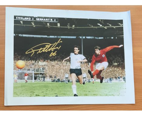 Football Geoff Hurst signed 16x12 colour photo pictured during the 1966 World Cup Final. Good condition. All autographs come 