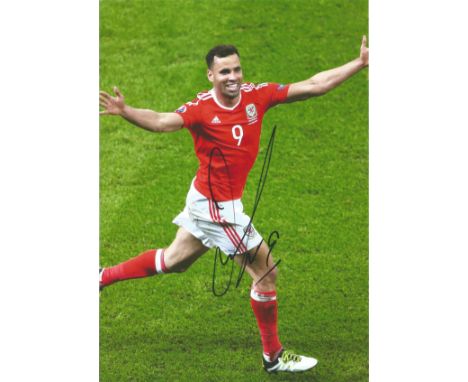 Football Hal Robson Kanu signed 12x8 colour photo pictured celebrating while playing for Wales. Thomas Henry Alex Hal Robson-