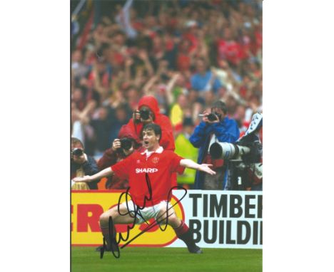 Football Mark Hughes signed 12x8 colour photo pictured celebrating while playing for Manchester United. Leslie Mark Hughes, O