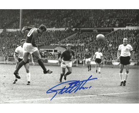 Football Geoff Hurst signed 12x8 black and white photo pictured in action during the 1966 World Cup Final. Good condition. Al