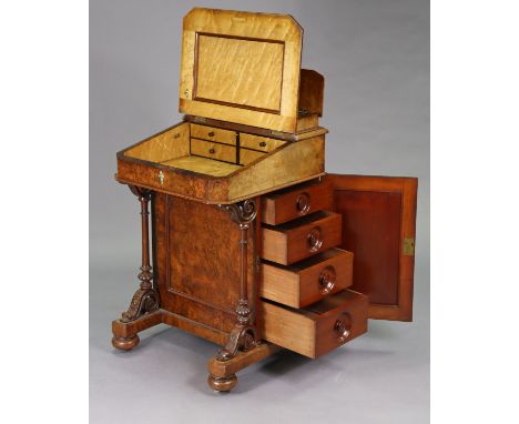 A Victorian burr-walnut davenport with satinwood interior enclosed by sloping hinged lid, inset tooled leather writing surfac