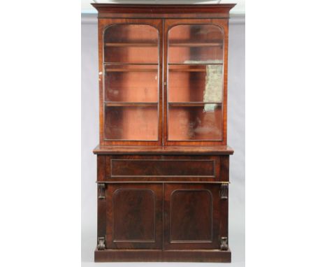 A Victorian mahogany secretaire bookcase, with moulded cornice above three adjustable shelves enclosed by pair of glazed door