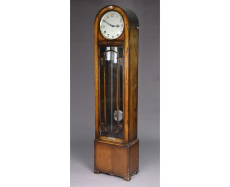 A mid-20th century Enfield longcase clock with domed top, 10” dia. silvered dial with Arabic numerals &amp; inscribed “James 