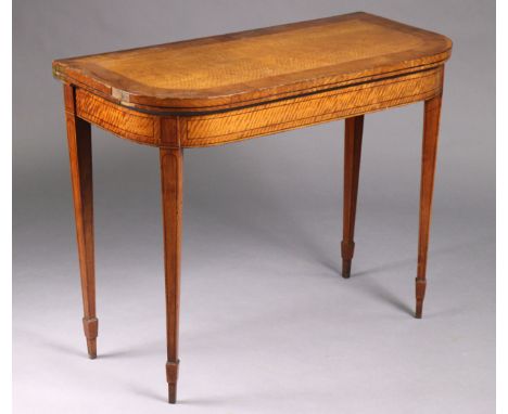 A George III inlaid satinwood card table with rounded corners to the rectangular fold-over top, inset dark green baize, &amp;