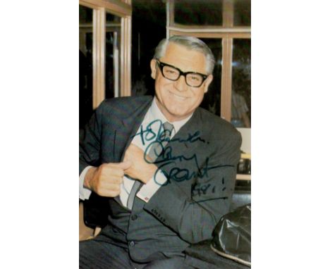 Cary Grant signed 6x4 inch colour photo. Cary Grant (born Archibald Alec Leach;[a] January 18, 1904 – November 29, 1986) was 