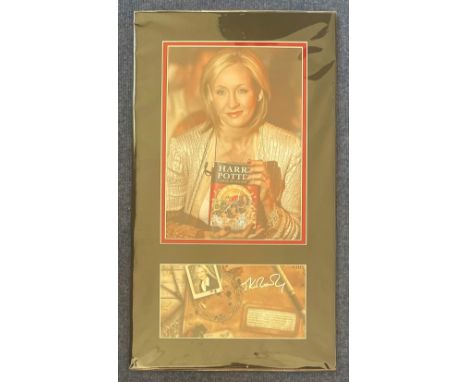 Author, J. K. Rowling 20x12 matted signature piece featuring a colour photograph of the famous author holding her Harry Potte