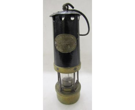 An E. Thomas and Williams Aberdare brass and metal miner's safety lamp, type number 4, number 109