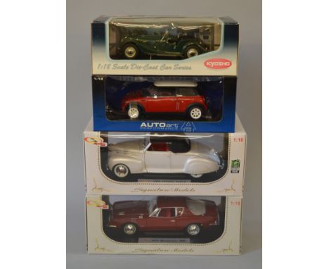 Four boxed diecast models in 1:18 scale including a Kyosho Morgan 4/4, an AutoArt Mini Cooper, and two Signature Models -  a 