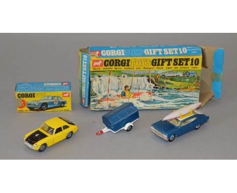 A boxed Corgi GS10 Marlin Rambler Sports fastback and trailer with one kayak on roof, with figure(in trailer), no paddle, app