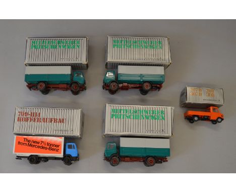 Five boxed NZG diecast Mercedes-Benz Trucks, including three covered wagons, a box van  and an open truck all in  1:50 scale 