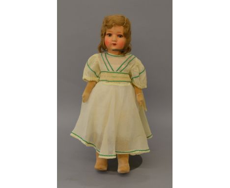 A very rare 1930' s Chad Valley 19" composition head doll, velveteen body, brown glass eyes, red Hygienic Toys made in Englan