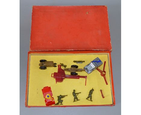 A boxed vintage Bell Toys plastic military vehicle and figure set which includes two armoured vehicles, guns, a tractor and f