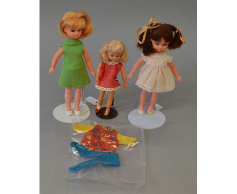 3 x 1960's Dolls. 2 x 1960's Dress up dolls, 1 wearing patch sling back shoes, 1 in original outfit. 1 x 1960's Very rare Sin