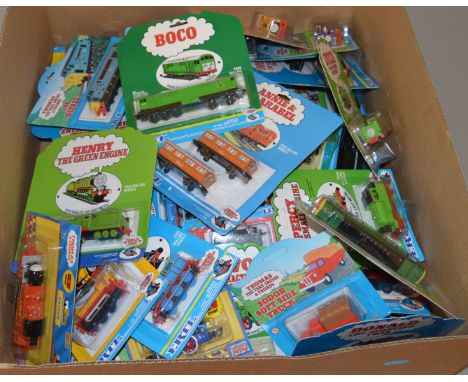 A good quantity of carded ERTL 'Thomas the Tank Engine' diecast models. All appear VG on G+/VG cards.(50+)