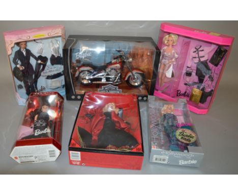 Five boxed Barbie Dolls including Mann's Chinese Theatre Barbie and the 'First Barbie of 2000' together with a boxed Barbie H