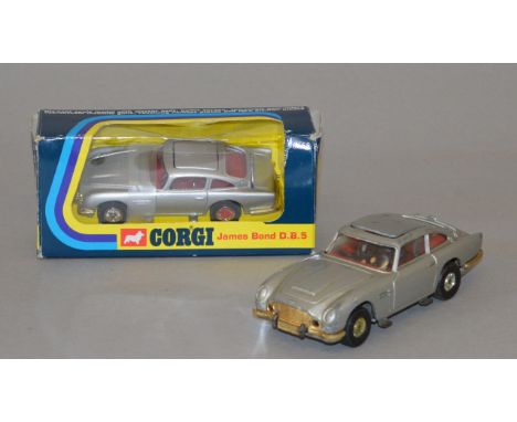 A boxed Corgi Toys 96655 James Bond DB5, in 1:43 scale, appears VG in G box together with an unboxed Aston Martin DB5 in 1:36