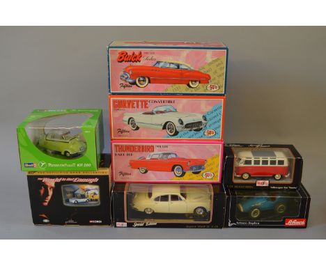A mixed lot of boxed diecast and tinplate models in various scales, including a boxed  Schuco Replica Grand Prix Racer 1070 i