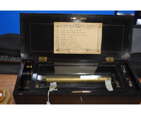 A 19th Century swiss music box, playing 8 airs