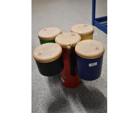 A set of five Remo pretuned bongo drums, with pair of beaters