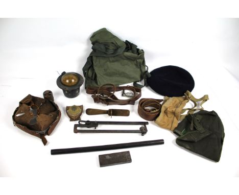 A mixed lot including a compass, leather straps, bandolier etc.