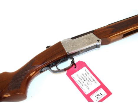 A .410 O/U shotgun by Investarm Ser. No. 262750, 27½" barrels with mint bores and 3" chambers, overall in excellent condition