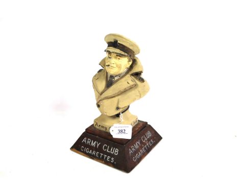 An Army Club cigarette advertising bust on wooden plinth, approx. 11½" high (A/F)