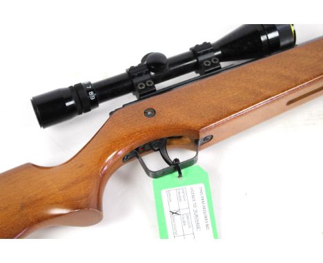 An original Mod. 45  .22 break barrel air rifle. Ser. No. 327221 with 3-9 x 40 Nikko Stirling telescopic scope. In overall go