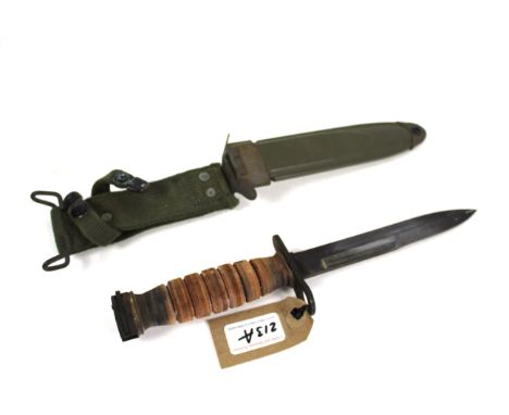 A M1 carbine bayonet with scabbard 