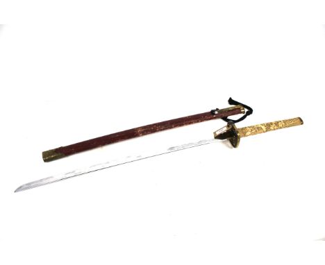 A very decorative Katana style sword with scabbard