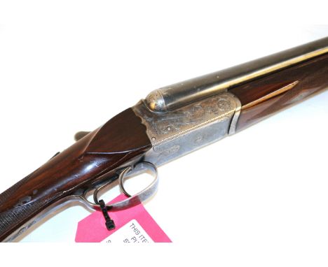 A 12 bore B.L.E. side-by-side shotgun by Sarasqueta with 29¾" barrels having clean bores. Ser. No. 222593NB. This item can on