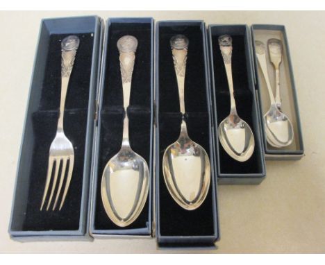 Fox Terrier Prize, three silver spoons and a fork along with two small spoons  