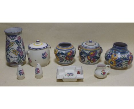A collection of Poole pottery, including four early Carter, Stabler Adams pieces  