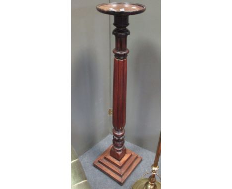 A William IV mahogany torchere, together with a brass standard lamp and a 19th century pot cupboard (3)  