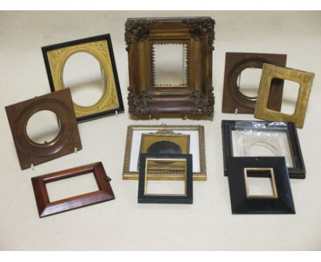 A collection of eleven square and rectangular period portrait miniature frames, a mixture of plain wood and gilt, the smalles