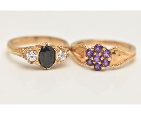 TWO 9CT GOLD GEM SET RINGS, the first an amethyst flower cluster ring, hallmarked 9ct Sheffield, ring size L, the second set 