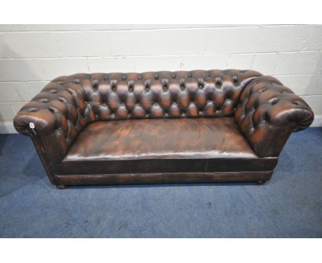 A BROWN LEATHER CHESTERFIELD DROP END SOFA, with buttoned backrest and armrests, length 203cm x depth 87cm x height 72cm (con