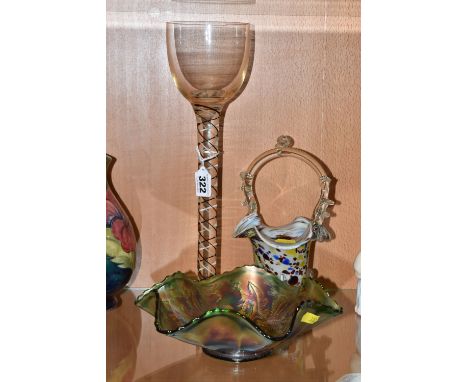 THREE PIECES OF ORNAMENTAL GLASSWARE comprising a green carnival glass fruit bowl with thistle patterns, diameter 23cm (arrow