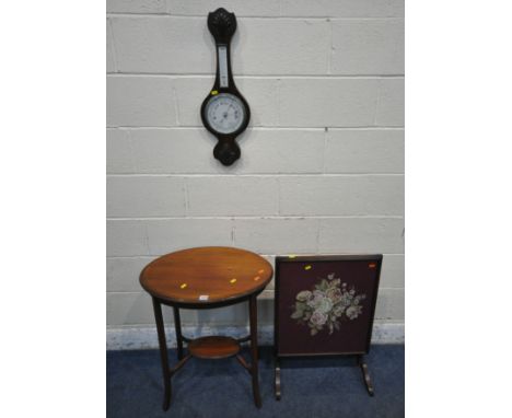 AN EDWARDIAN MAHOGANY OVAL OCCASIONAL TABLE, raised on shaped legs, united by an undershelf, width 60cm x depth 42cm x height