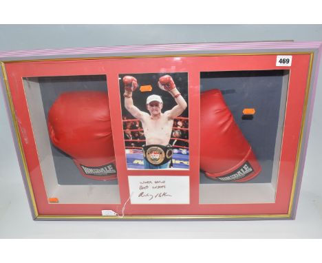 A DISPLAY CASE BEARING THE SIGNATURE OF RICKY HATTON with pair of Lonsdale boxing gloves, and a photo of him with the World B
