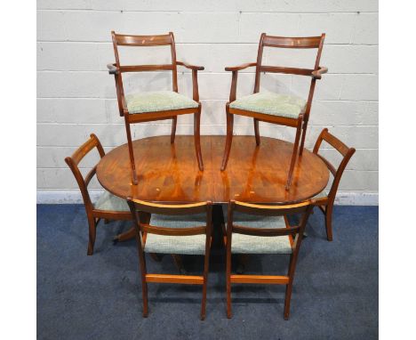 A LATE 20TH CENTURY OVAL DINING TABLE, with one additional leaf, both sections with a tilt top, raised on tripod legs, length