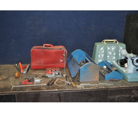 A METAL TOOLBOX AND A DUNLOP SPORTS BAG CONTAINING HAND TOOLS, including an engineers marking stand, two vee blocks, a Verdic
