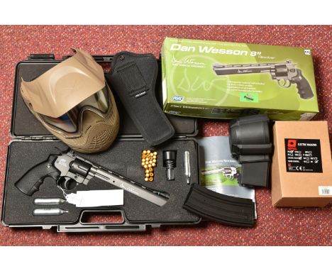 A DAN WESSON 8'' CO2 POWERED 6MM AIRSOFT GUN, in a plastic carrying case, with pellet cannisters, co2 capsules, extended maga