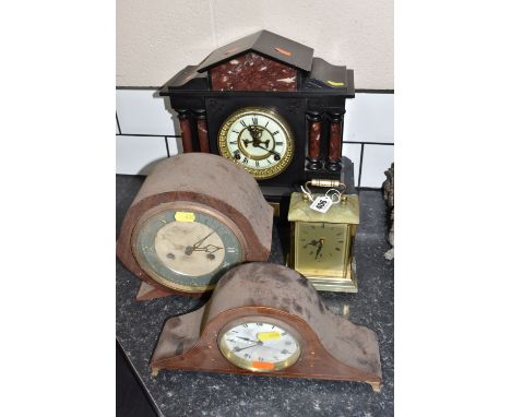 A GROUP OF FOUR VINTAGE CLOCKS to include a black 'Ansonia' slate clock with a brass dedication plaque dated 1897, height 32c