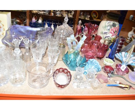 A COLLECTION OF COLOURED GLASS, comprising a collection of Victorian cranberry glass, a blue glass obelisk, cut glass salts, 