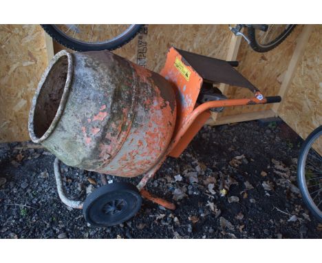 A BELLE PETROL CEMENT MIXER, with a Honda G100 2.5 petrol engine, engine pull but not tested any further, well rusted, dented
