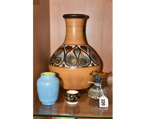 A GROUP OF FOUR CERAMIC VESSELS to include a Doulton Lambeth stoneware vessel, height 9cm, central band of relief floral patt