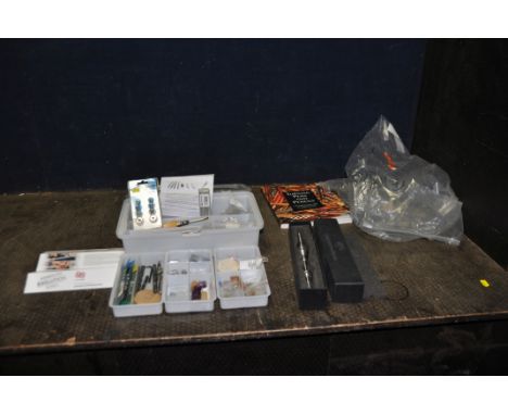 AN AXMINSTER EVOLUTION SERIES COMPRESSION PEN MANDREL, along with a pen making book, a case containing tools, accessories and