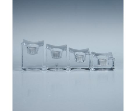Sophisticated set of graduated votive candle holders featuring a sleek slanted top on each cube for a modern touch. Shortest 