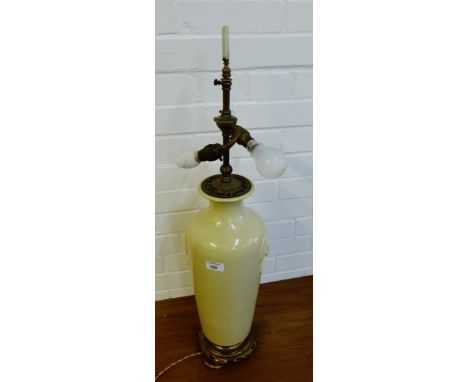 A cream glazed Chinese baluster table lamp base, ormolu mounts and jade plaque to top, 81cm high overall